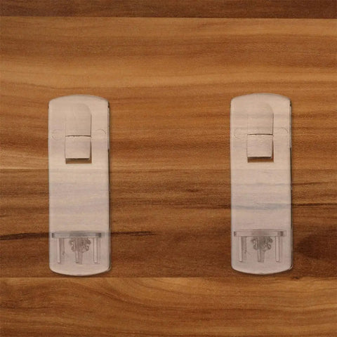 Beefy Heavy Duty Shelf Pegs 50 Pack L Shaped Cabinet Shelf Support Clips on wooden surface