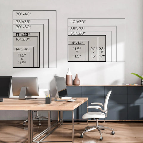 Office with desks and size chart showing various bulletin board dimensions on wall, highlighting 23" x 17" board size.