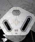 Tri Slot Cutter Stencil Kit Pro Grade 3 Piece Guide For Precise Slot Cuts 0.430 Inch Diameter Includes Laser Etched Sizes Centerlines And Slot End Marks Included template on metal surface with cut slots visible