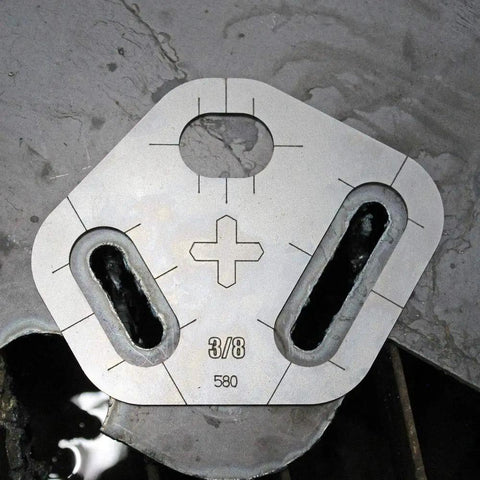 Tri Slot Cutter Stencil Kit Pro Grade 3 Piece Guide For Precise Slot Cuts 0.430 Inch Diameter Includes Laser Etched Sizes Centerlines And Slot End Marks Included template on metal surface with cut slots visible