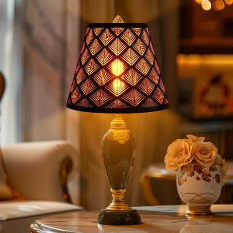 Stylish table lamp with decorative shade on a round table in a cozy living room setting