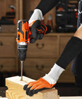 Person using a drill while wearing Solid Cut Resistant Forearm Sleeves With A Grippy Nonslip Fit And Thick Reinforced Seaming.