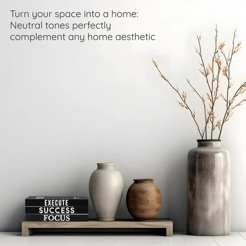 Monochrome Faux Book Decor Set Of 3 For Modern Desk And Shelf Vibe next to neutral vases and twigs on a minimalist shelf