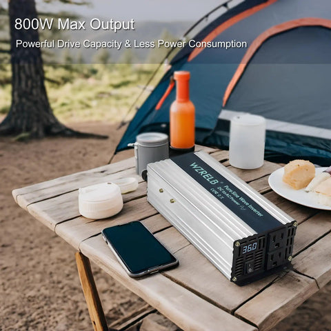 Solid 1000 Watt Pure Sine Wave Inverter Yanks Quick 48 V DC And Turns It Into Smooth 110 120 V AC With Dual Outlet Plugs And Crisp LED Display Off Grid Portable Power Converter Ready For RV Builds And Backyard Hangouts on picnic table next to camping gear.