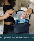 Person placing bottles in the Ride Or Die Breast Milk Cooler Kit With Six Chill Bottles And Triple Freeze Packs For Grab And Go Nursing Pump Storage Keeps Every Drop Ice Cold Always.