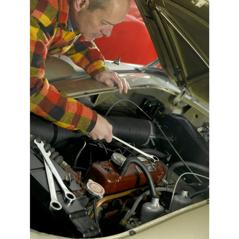Mechanic using Three Eighths Inch Ratcheting Wrench With Seventy Two Tooth Box End Minimal Five Degree Swing Off Corner Loading in car engine