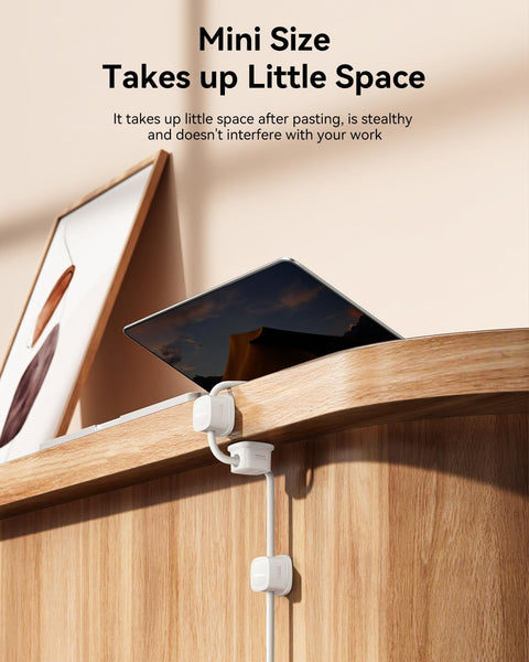 Installed Six Pack Magnetic Cable Clips With Smooth Adjustable Adhesive Cord Organizer on a wooden desk for cable management