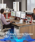 Office setting with people working on computers, showcasing simple recorder function for the 64GB Sport Clip On MP3 Player With Bluetooth 5.3 Ultra Light Mini Clip On Recorder No FM MicroSD Support Shuffle Playback For Running Cycling Hiking Climbing And Yoga.