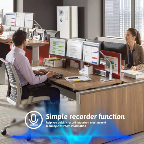 Office setting with people working on computers, showcasing simple recorder function for the 64GB Sport Clip On MP3 Player With Bluetooth 5.3 Ultra Light Mini Clip On Recorder No FM MicroSD Support Shuffle Playback For Running Cycling Hiking Climbing And Yoga.
