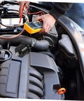 Mechanic testing car engine with Aluminum Brake Fluid Reservoir Drift Oil Tank for cars high performance car brake oil cup.