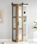 Double 18x84 Frosted Glass Bifold Barn Door Set With Hardware Kit included, shown installed in room setting