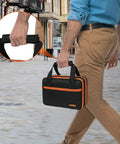 Man carrying Rugged Double Layer Carrying Case For Electrical Testing Gear Fits ET310 ET80101 ET80016 with handle insert detail.