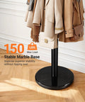 Heavy Duty Coat Rack With Marble Base And 16 Hooks Freestanding Coat Tree with coats and bags emphasizing stability