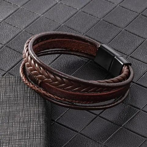Fresh Brown Braided Leather Bracelet For Men And Women Unisex Premium PU Leather Wristband Jewelry on textured surface.