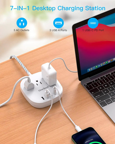 20W USB C Desktop Power Strip With 3 AC Outlets, 3 USB-A Ports, And 1 USB-C Fast Charge on desk with laptop and phone