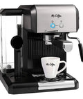 Your New Favorite Hustle Free Automatic Espresso And Cappuccino Maker Featuring Boss Level 15 Bar Pressure And Thermal Heating For Truly On Point Lattes In Silver And Black with a removable water reservoir and steam wand.