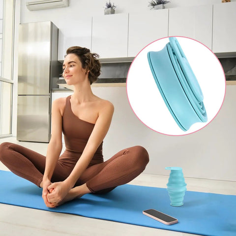 Woman on yoga mat with Foldable Silicone Water Bottle For Travel And Gym, Ultra Lightweight Leak Proof Hydration Flask nearby.