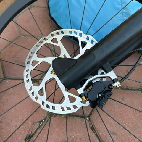 Beefy 180mm Six Bolt Bike Disc Brake Rotor for Road and Mountain Bikes 2.3mm Thick SUS410 Stainless Steel mounted on wheel