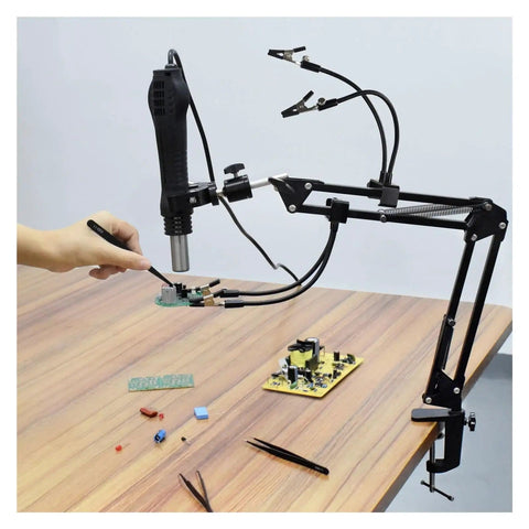 Third Hand Soldering Station With Adjustable Gooseneck Arms And PCB Holder Welding Help Tool in use on a table