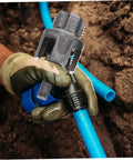 Cabilock 3 Pc Electric Drill Pipe Threader Kit For Cutting Plastic And Metal Pipes in use for threading blue PVC pipe.