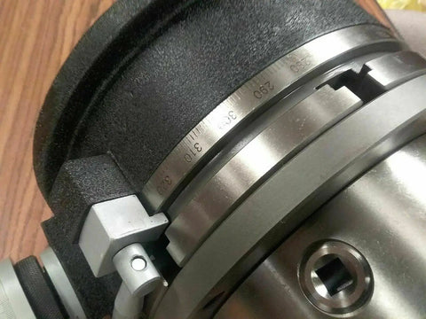 Close-up detail of the 12 Inch Precision Rotary Table Featuring Killer Accuracy 10 Inch 3 Jaw Chuck with graduated scale.