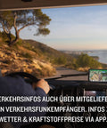Driver using a 7 Inch Caravan Navigation System with Real Time Traffic, preloaded 3D maps on a scenic road in Europe