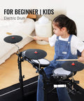 Child playing Electric Drum Set For Beginners And Kids That Slaps with 7 inch quiet mesh pads in a home setting