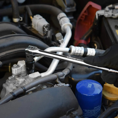 Using Three Eighth Inch Drive Breaker Bar With Twelve Inch Handle And 180 Degree Flex CrMo Head in engine repair