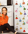 Smiling woman sitting by fridge decorated with Goose Diamond Painting Magnets Set For Fridge 30 Pieces Dope 5D Rhinestone Gem Art Kit.