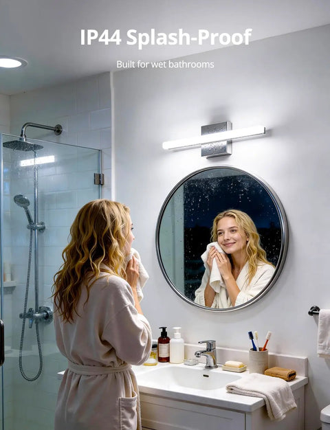 Woman using Sleek Over Mirror Vanity Light Fixture 16 Inch Chrome LED Bar 9W Cool White 6000K Non Dimmable Bathroom Wall Light