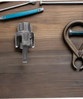 Heavy-Duty 3PC Pipe Threader Tool Kit For Plastic And Metal Water Pipes Steel construction threader tool on wooden surface.