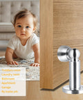 Heavy Duty Magnetic Door Stopper For Wall And Bottom Of Door With Adjustable Height From 3.15 To 4.8 Inches Windproof Anti Slip Stainless Steel SUS304 One Piece Construction Durable Premium Door Hardware For Home Office And Commercial Use installed on door, with baby crawling nearby.