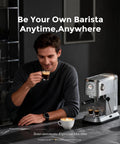 Zero Hassle Compact Espresso Maker With Milk Frother, 20 Bar Pump Delivers Quick Shots, 50 Ounce Tank on countertop with person drinking espresso.