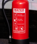 Rad Miniature Resin Fire Extinguisher 1/4 Scale Replica featuring sharp printed safety instructions on a red prop.