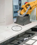 Premium Nichrome Heating Element For Heat Sealing Machines Silver Replacement Strip on machine table with robotic arm.