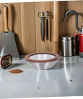 Mm Bowl Shape Diamond Grinding Wheel Cup Abrasive Tool For Angle Grinder on a workshop counter with metal tools.