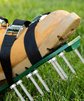 Close-up of a shoe equipped with a 30 Piece Lawn Aerator Shoes Spikes Set For Lawn Care And Yard Maintenance on grass.