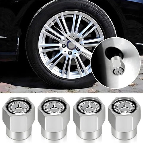 Mercedes Benz Tire Valve Stem Cap Covers 4 Pack Dope Alloy Caps with O Ring Seal on car wheel, close-up view