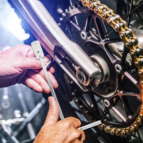 High Carbon Steel T Handle Socket Wrench With Hex Grip used on a motorcycle gear mechanism for precision adjustment.