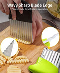 Front view of green-handled 4-piece stainless steel crinkle cutter set for vegetables