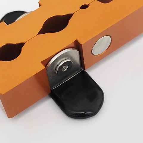 Magnetic Clamp Vise For Bike Parts Adjustable Axle Spindle Holder in orange showing anodized aluminum body and 4mm to 36mm clamp range.