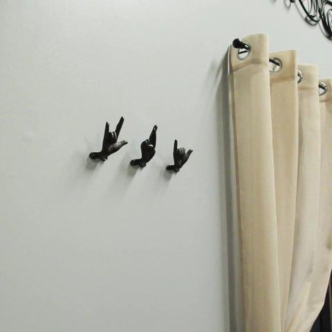 Set Of 3 Hand Gesture Wall Hooks, Super Handy Rustic Cast Iron Decor, 4 Inch Hella Tough Metal Coat Rack on wall with curtains.