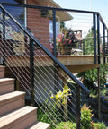 Cable railing installation on deck using heavy duty wire cutters for steel cable and wire rope, up to 5/32 inch, with hardened steel blades.
