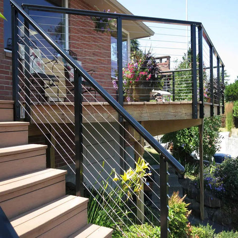 Cable railing installation on deck using heavy duty wire cutters for steel cable and wire rope, up to 5/32 inch, with hardened steel blades.