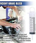 GAOLAOSY brake bleed kit with 100 ml syringe and 50 cm hose; side view of mechanic bleeding car brakes.