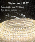 Waterproof LED Rope Lights 32.8Ft Ultra Bright 1200 LEDs 2835SMD 24V DC Warm White 3500K shown in rain with IP67 protection