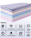Front view of pastel microfiber glasses cleaning cloths stacked in a multicolor set