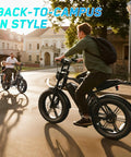 Two adults riding Beast Built Fat Tire Electric Bike For Adults With 1500W Peak Motor 60 Mile Range 48V 15Ah on campus road.