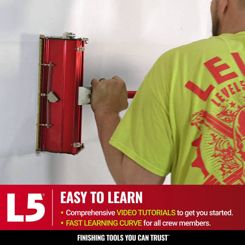 Worker using Automatic Drywall Taping And Finishing Tool Set With 10 Inch And 12 Inch Flat Boxes 3 Inch Angle Head