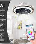 Bladeless 20 Inch Low Profile Ceiling Fan With Lights And Remote Modern Flush Mount Enclosed Ceiling Fan With Bluetooth App Control Music Speaker 6 Speed Reversible Remote Or Wall Switch Operation Golden Black Finish in a bedroom with app control visible on smartphone.